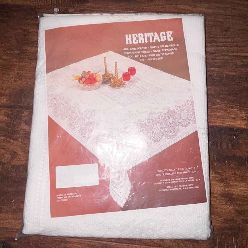 New old stock lace tablecloth 60”x80”